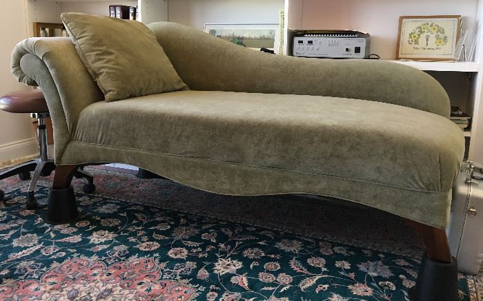 Faux suede chaise, some wear and minor spots, very comfortable.