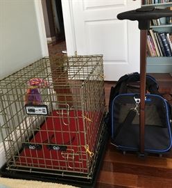 Dog crate 24" x 18" x 20" and rolling pet travel carrier.