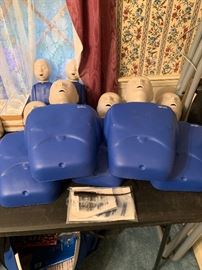 Set of 8 CPR dummies with bag and instructions, practically new