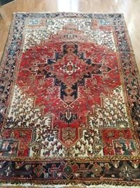 LOVE the Persian rugs all over this house! This one is a Persian Heriz, hand woven, 100% wool face, measures 8' 6" x 11' 6".