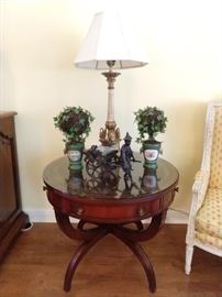 One of a pair of mahogany drum tables, with one of a pair of vintage Italian Florentine wooden swan table lamps, a pair of 2-piece porcelain cache pots and bronze male Asian figurine, with cart.