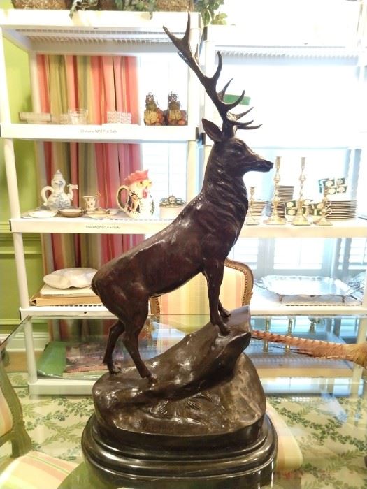 One of a pair of bronze stags, signed J. Moigniez.