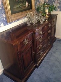 This lovely dining room buffet provides great surface display space and drawer storage.