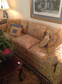 Three-cushioned sofa