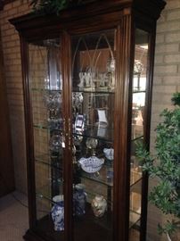 Large lighted curio cabinet