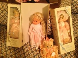 Some dolls are still in the boxes.