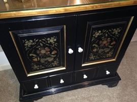 Painted cabinet with white knobs