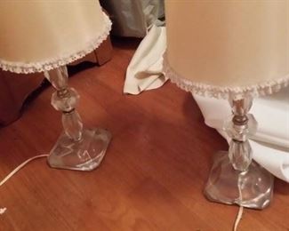 Two different sets of two; small working antique crystal lamps