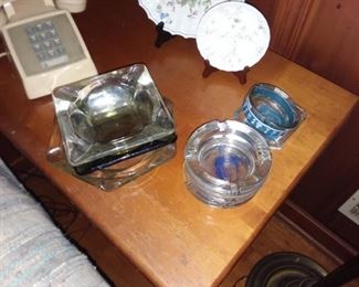 Ashtray collectors!
Many different styles and materials.  Several vintage telephones!