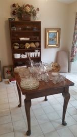 Great vintage expanding table with storage compartment, punch bowls, punch cups, bookcase, milk glass, tray, covered jars, large-scale fruit decor