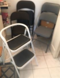 Cushioned folding chairs 6 total and step stool