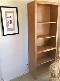 Tall blond  wood bookshelf