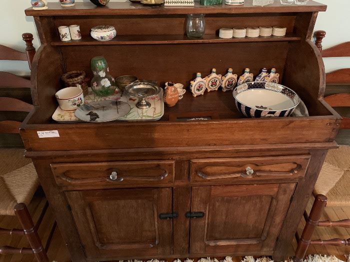 Pine hutch with assorted contents