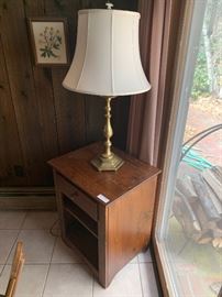 Pine 1 drawer table with a heavy brass lamp