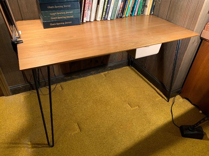 Mid-century hard wood top table with metal legs along with a lamp