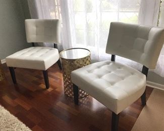 White Leather Side Chairs and Mirrored Top End Table