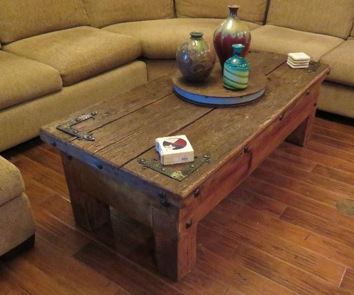 Rustic coffee table purchased at Rios Interiors