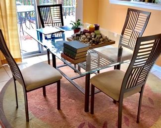 Glass top dining table and chairs