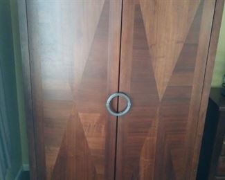Upright wooden closet