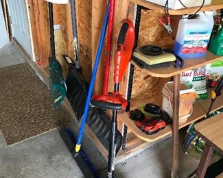 Battery operated Black & Decker Weedwhacker and pick axe