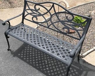 Black iron park bench