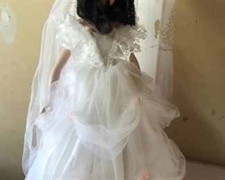 Porcelain doll in wedding gown
