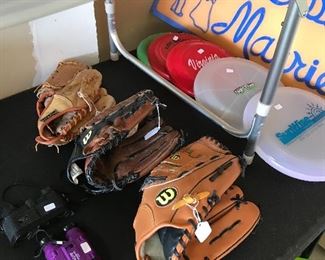 New baseball mitts, frisbees and binoculars