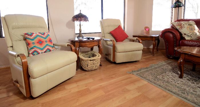 Superb matching recliners. Great neutral color. Pillows and rugs for sale too.
