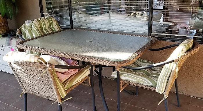 Patio table and chairs for sale.