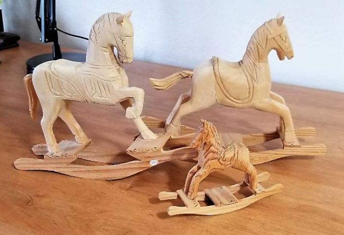 Wooden horses for sale.