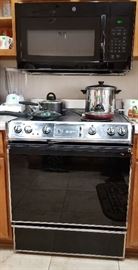 Recently purchased microwave for sale. Also the stove is for sale.