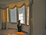 Gold, lined drapes which can be used as is or cut to fit your window.