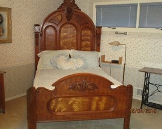ANTIQUE CARVED VICTORIAN BED WITH A 7 1/2' (APPROX) HEADBOARD