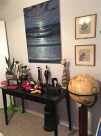 Floor standing globe, signed Elizabeth O'neil Verner prints
