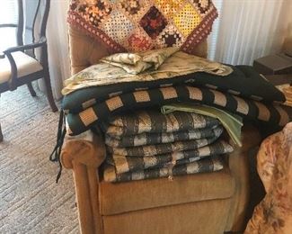 nice collection of linens and quilts