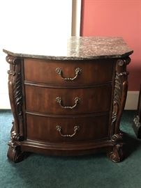 One of a pair of Marble Side Tables with King Poster Bed
