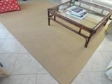 BEAUTIFUL HEAVY STRAW TOP WITH BACK THAT HOLDS RUG TO FLOOR.. EXCELLENT CONDITION... THIS ONE IS REC ROOM