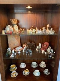 Tea cups and dog figurines 