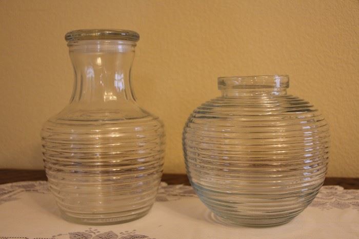 Sample of glass storage jars, some with lids