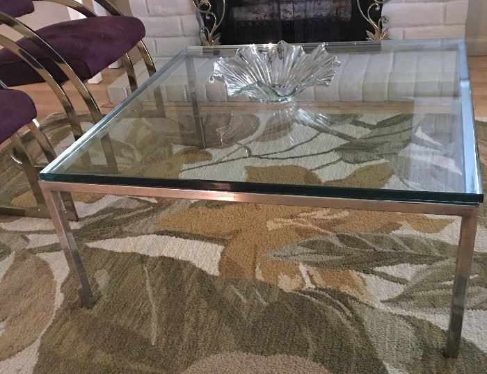glass top coffee table on chrom frame