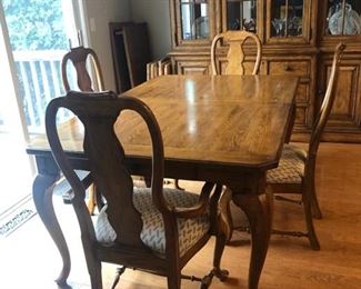 Matching dining room table  with 2 drawers on either end of the table for storage and 6 chairs - 68”W x 44”D includes 2 - 20”W leafs!
