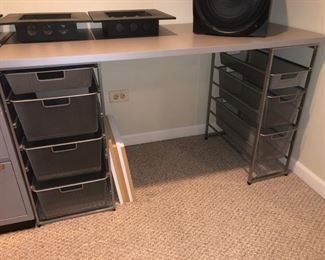 Elfa storage racks with a desk top