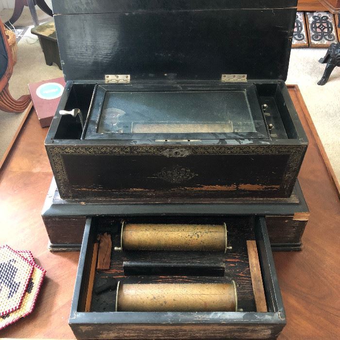 Antique Cylinder Music Box in Excellent Working Condition! The Cabinet contains a Pull Out Drawer which contains 2 more Cylinders!!! The sound is Absolutely Beautiful!!!