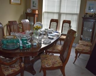 Gorgeous Dining Set ( the pic does not do it justice )! Beautiful Double Pedestal Table with 10 Matching Chairs, Leaves and Custom Pad also notice how nicely the two matching Display Cabinets accentuate this Lovely Set!