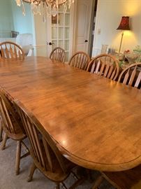 #23 oak dining table w double pedistal base w 2 leaves and 10 chairs -103x 43x29 $400.00