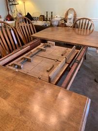 #23 oak dining table w double pedistal base w 2 leaves and 10 chairs -103x 43x29 $400.00