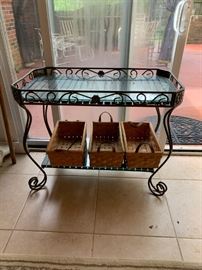 #27 black iron glass top planter table 35x18x28 $75.00