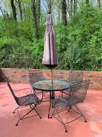 #29 round wrought iron table w 4bouncy chairs 41 x 30 $150.00