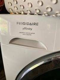 #39 frigadaire washer /Dry front load on stand as is $200.00