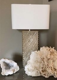 Elegant lamp with rectangular linen beige lamp shade. The base is silver.  Coral and quartz are not for sale.